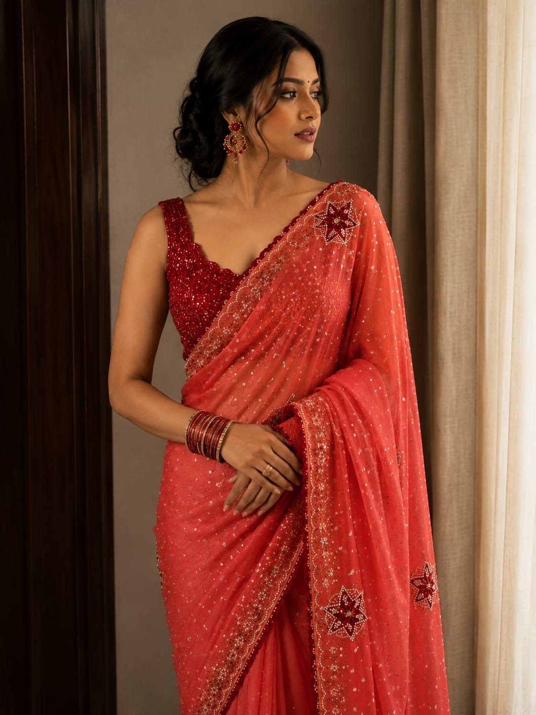 Coral Red Sequin Georgette Saree with Embellished Border